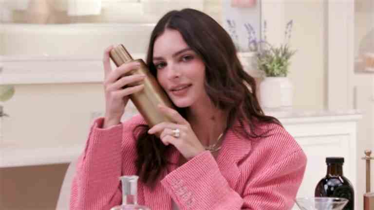 Emily Ratajkowski holding martini shaker in Who