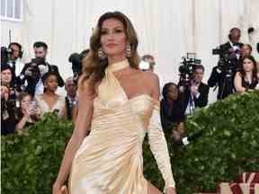 Gisele Bundchen arrive pour le Met Gala le 7 mai 2018 au Metropolitan Museum of Art de New York.