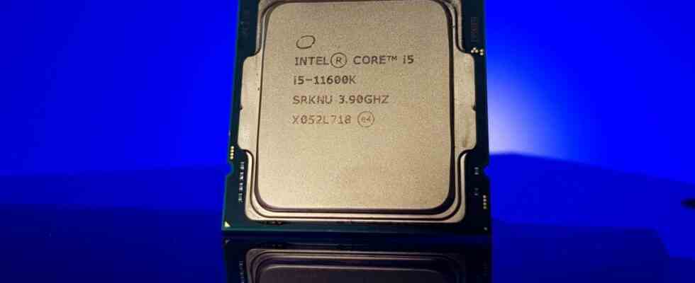 Intel Core i5 11600K processor shot on a blue background from the front