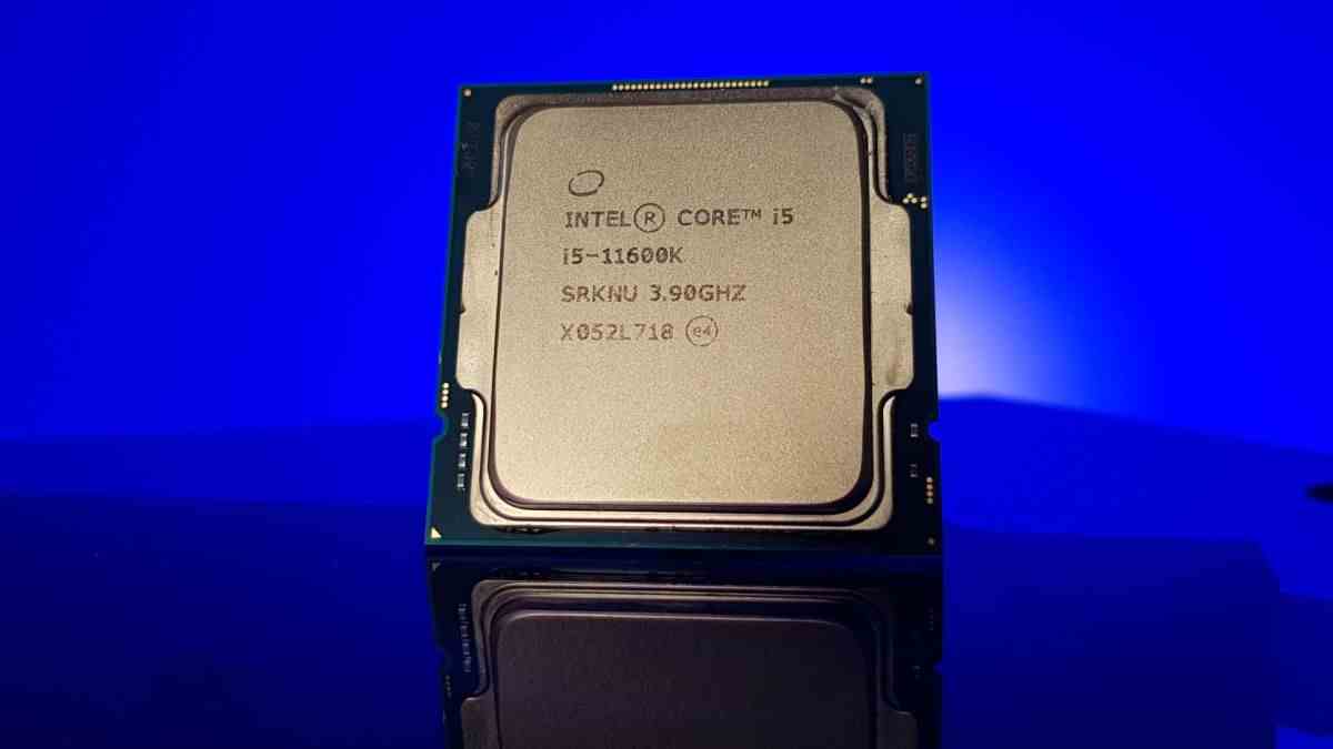 Intel Core i5 11600K processor shot on a blue background from the front