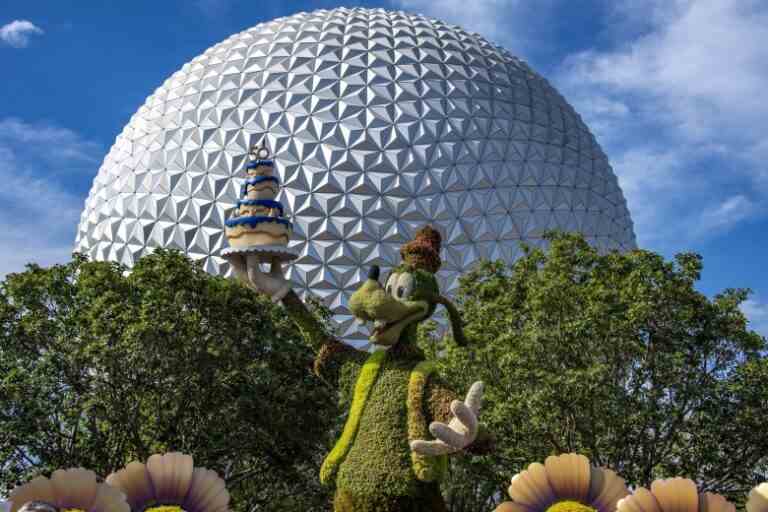 ORANGE COUNTY, FLORIDA, USA - MAY 30: A view of a topiary display of Goofy with Spaceship Earth in the background during the Flower and Garden Festival at Epcot at Walt Disney World in Orange County, Florida on May 30, 2022. Walt Disney World is celebrating its 50th anniversary all of 2022. (Photo by Joseph Prezioso/Anadolu Agency via Getty Images)