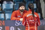 Reid Carruthers (à gauche) a travaillé comme entraîneur de l'équipe canadienne de Kerri Einarson qui a remporté un quatrième titre consécutif du Tournoi des Cœurs Scotties dimanche.