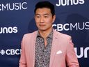 Simu Liu sur le tapis rouge des Juno Awards à Londres, en Ontario.  le dimanche 17 mars 2019. 