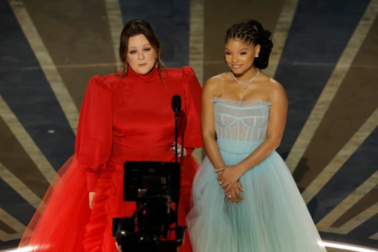 HOLLYWOOD, CALIFORNIA - MARCH 12: (L-R) Melissa McCarthy and Halle Bailey speak onstage during the 95th Annual Academy Awards at Dolby Theatre on March 12, 2023 in Hollywood, California. (Photo by Kevin Winter/Getty Images)