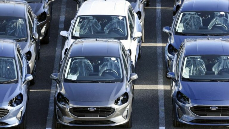 A lot of Ford cars parked together.