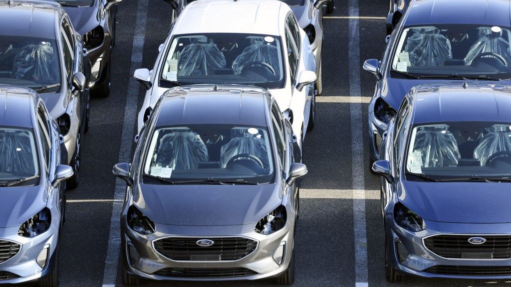 A lot of Ford cars parked together.