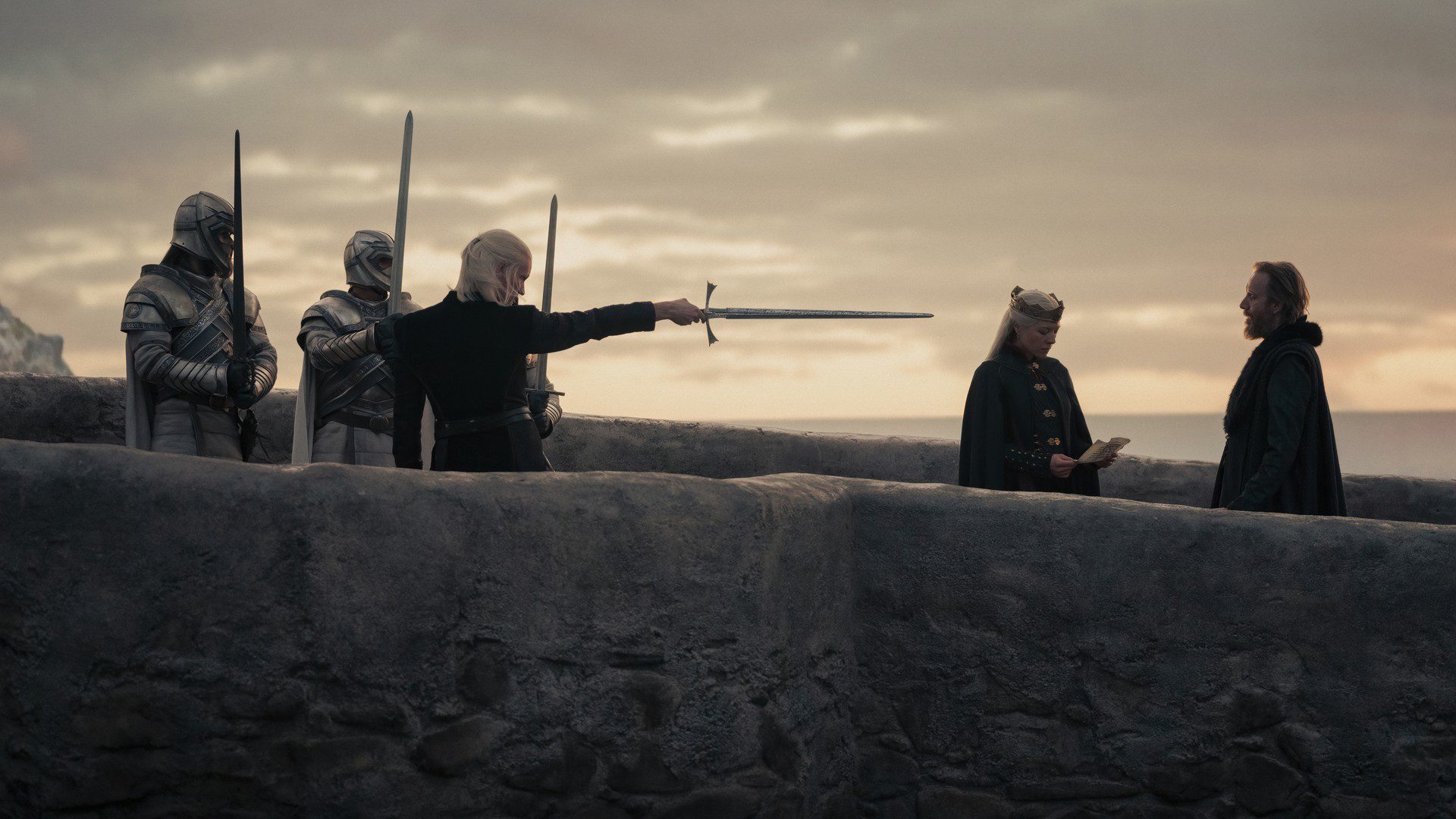 Daemon Targaryen (Matt Smith), Rhaenyra Targaryen (Emma D'Arcy), and Otto Hightower (Rhys Ifans) in the House of the Dragon season 1 finale.