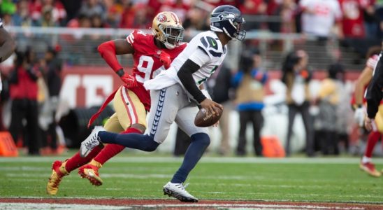 SANTA CLARA, CA - JANUARY 14: Geno Smith #7 of the Seattle Seahawks looks for a receiver against the San Francisco 49ers during the NFC Wild Card playoff game at Levi's Stadium on January 14, 2023 in Santa Clara, California. The 49ers defeated the Seahawks 41-23. (Photo by Michael Zagaris/San Francisco 49ers/Getty Images)