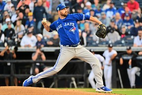 Le lanceur des Blue Jays Drew Hutchison livre un lancer aux Yankees de New York lors de la première manche lors d'un match de la Grapefruit League au George M. Steinbrenner Field le mardi 14 mars 2023 à Tampa, en Floride. Julio Aguilar/Getty Images