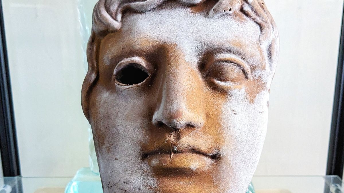 An image of a chocolate repica of a BAFTA Award, which appears as a classical dramatic mask.