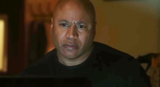 Sam Hanna checking the computer on NCIS: LA.