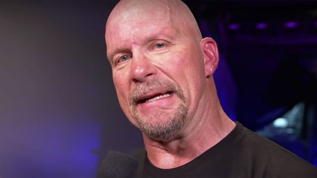 Stone Cold giving an interview after his match at WrestleMania 38.