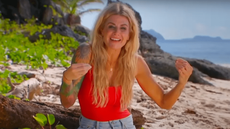 Carolyn talks on the beach during her intro interview for Survivor 44.