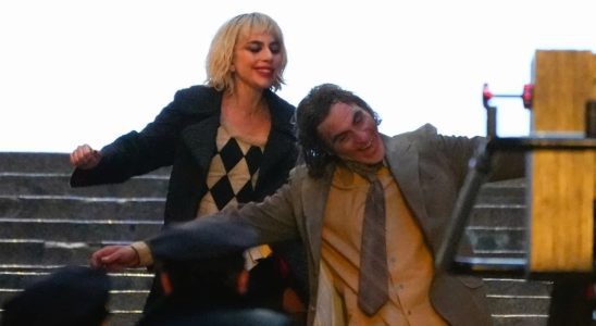 Joker: Folie à Deux (Joker 2) production photos show Lady Gaga and Joaquin Phoenix in full makeup on the first movie iconic concrete stairs.