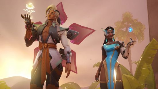 Overwatch 2 Lifeweaver : Lifeweaver et Symmetra se tiennent côte à côte, tous deux réfléchissant à leurs technologies respectives de particules lumineuses en parallèle l'une avec l'autre.