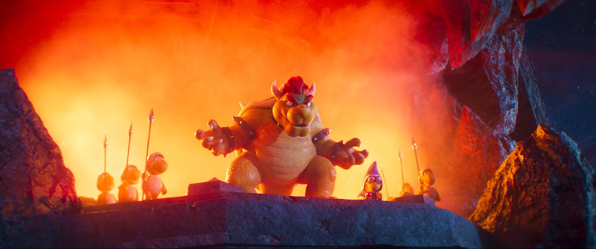 Bowser (Jack Black) debout sur une falaise avec des soldats à l'air menaçant