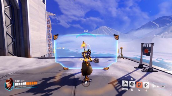 Overwatch 2 Brigitte ult rework : Brigitte se tient au garde-à-vous avec son bouclier de barrière soulevé sur une plate-forme dans la zone d'entraînement.