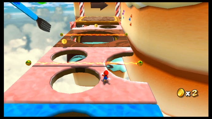 Meilleurs jeux Mario - Capture d'écran de Super Mario Galaxy montrant un petit Mario fuyant la caméra à travers des obstacles dans le ciel.