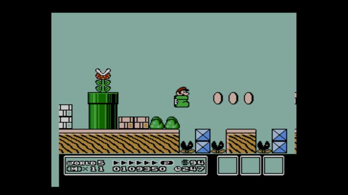 Meilleurs jeux Mario - Capture d'écran de Super Mario Bros 3 montrant Mario dans une botte.