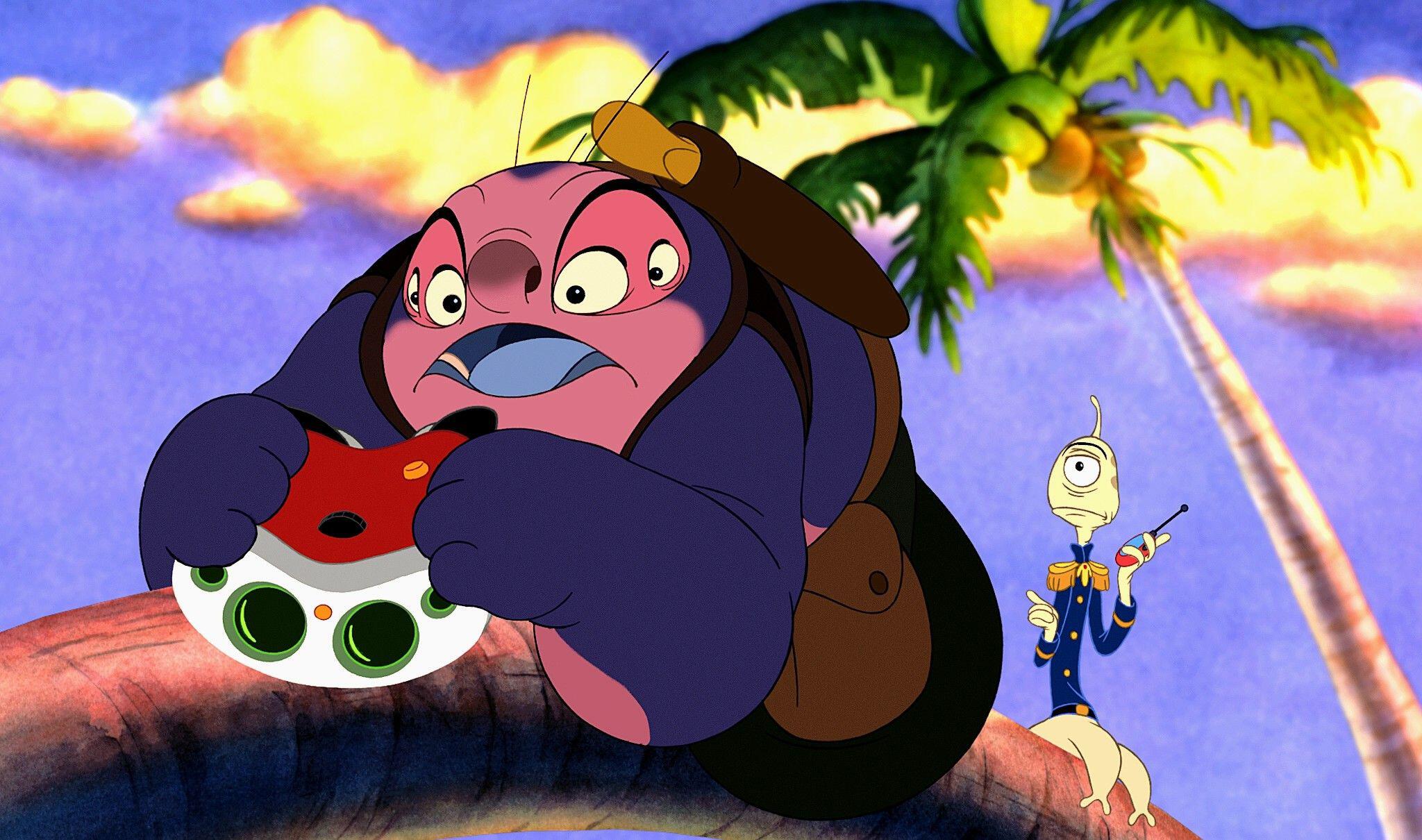 (De gauche à droite) Jumba Jookiba et Pleakley dans Lilo et Stitch