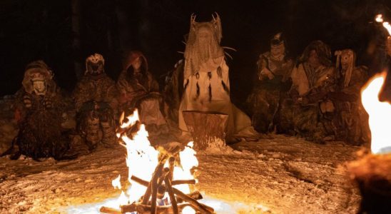 Antler Queen and others around fire in Yellowjackets