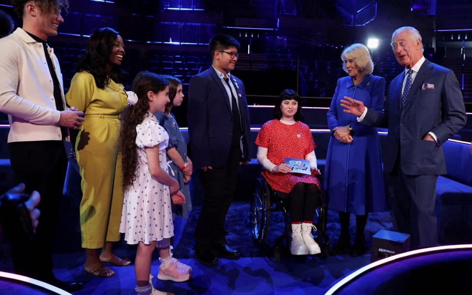 Le couple a rencontré les présentateurs et invités de Blue Peter - AFP