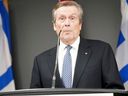 Le maire John Tory est photographié le 10 février 2023 alors qu'il annonçait qu'il démissionnerait de son travail après avoir eu une liaison avec une employée.