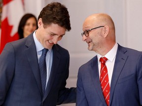 Le premier ministre Justin Trudeau et le ministre de la Justice David Lametti sont vus à Rideau Hall à Ottawa, le 20 novembre 2019.