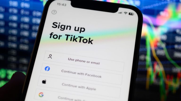 The TikTok logo is seen on a mobile phone screen in this photo illustration on 23 March, 2023 in Warsaw, Poland.