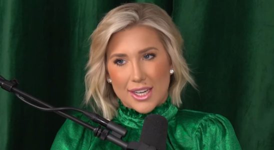 Savannah Chrisley in green shirt recording Unlocked with Savannah Chrisley podcast