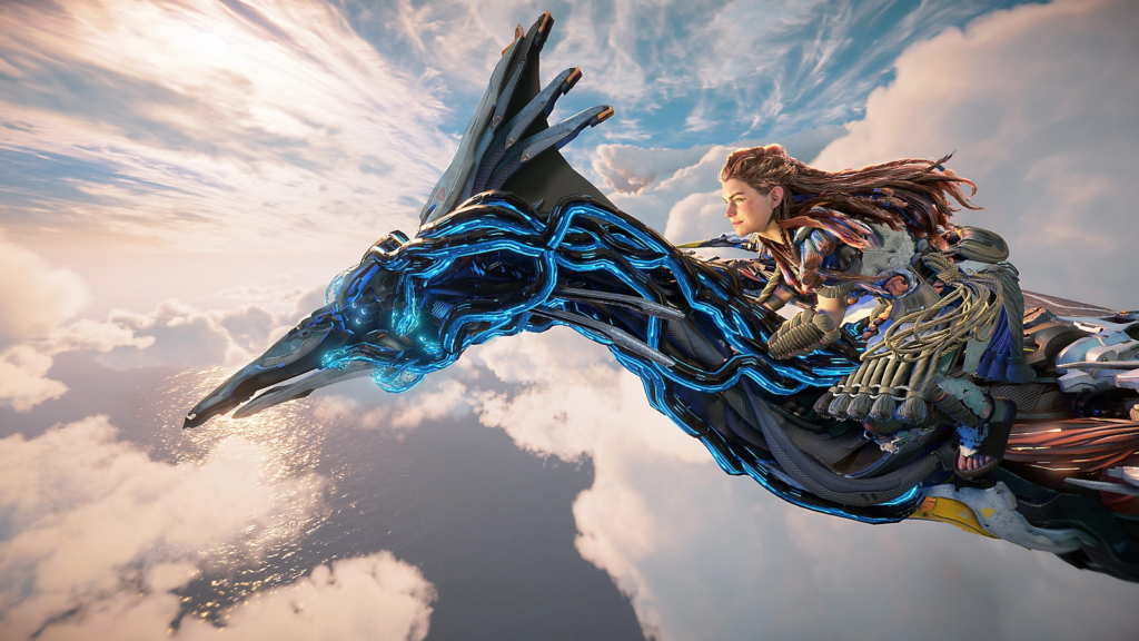 Horizon Forbidden West: Capture d'écran de Burning Shores montrant un gros plan d'Aloy volant à travers les nuages.