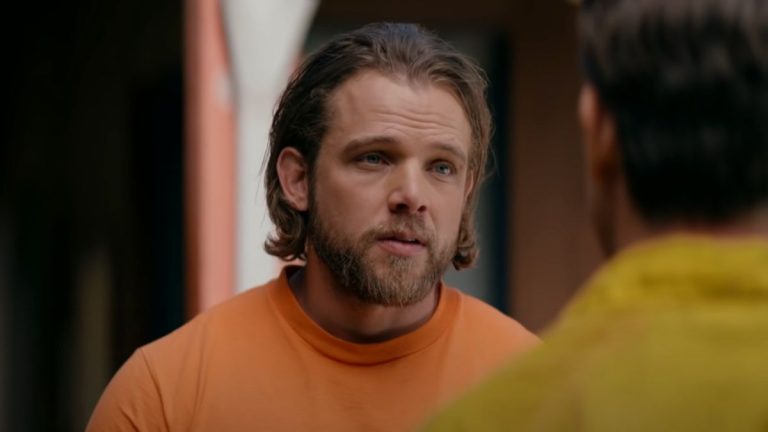 Max Thieriot as Bode talking to his captain in Fire Country.