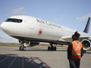 Un avion d'Air Canada.  Air Canada est la seule compagnie aérienne qui fait des affaires importantes en Asie.