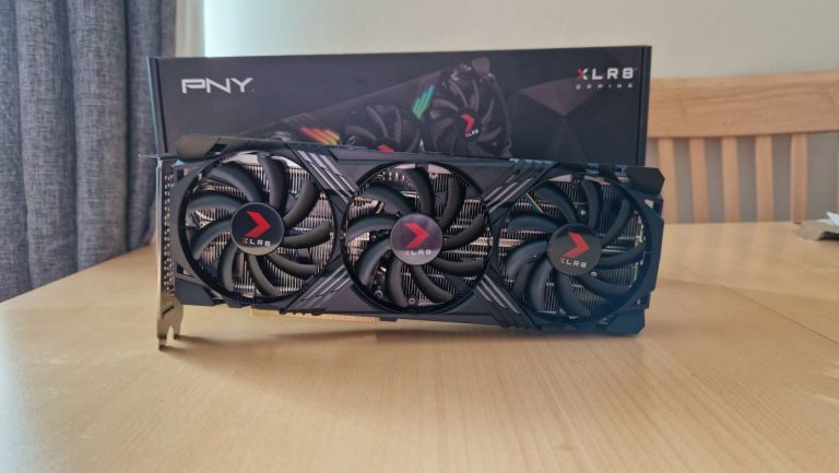 PNY GeForce RTX 4070 hero image of the GPU sitting diagonally on a table in front of its box