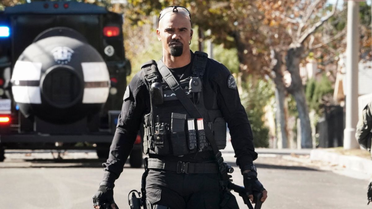 Shemar Moore walking toward the camera in SWAT gear on S.W.A.T.