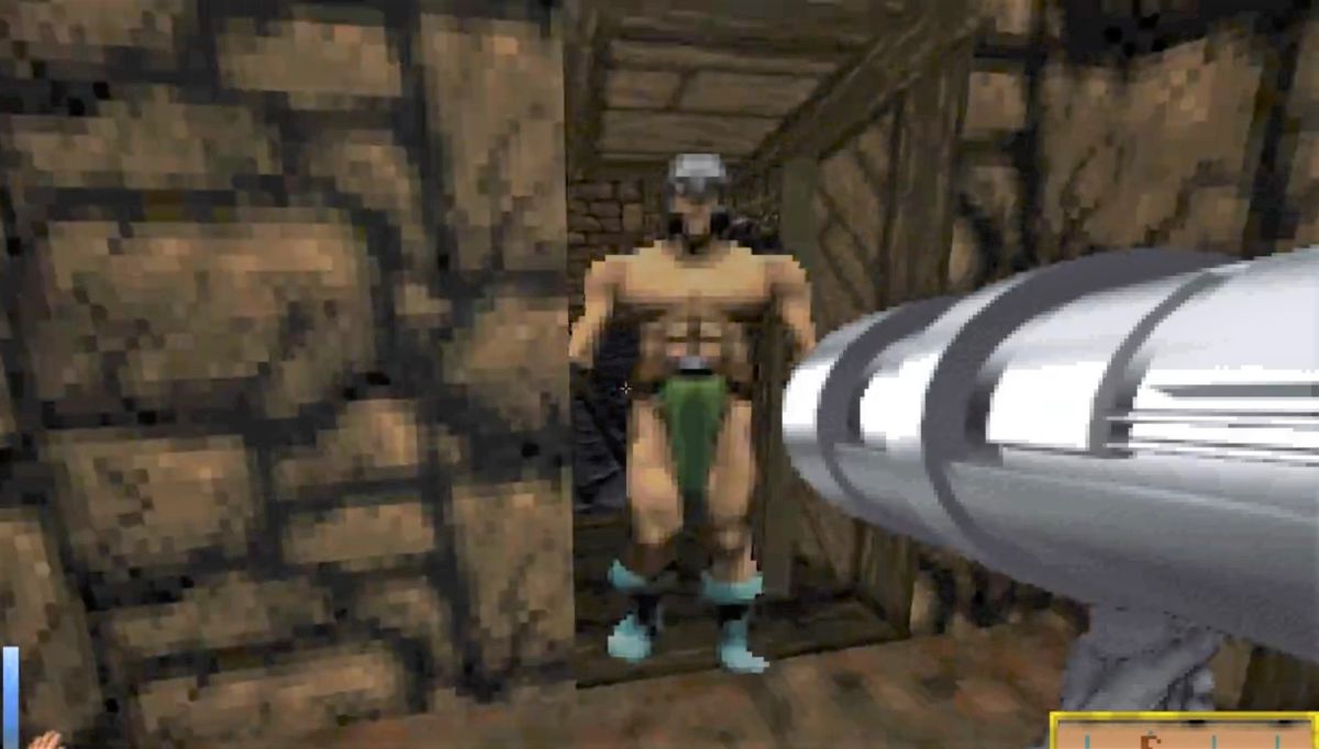 aiming a rocket launcher at a Daggerfall enemy in a dungeon room