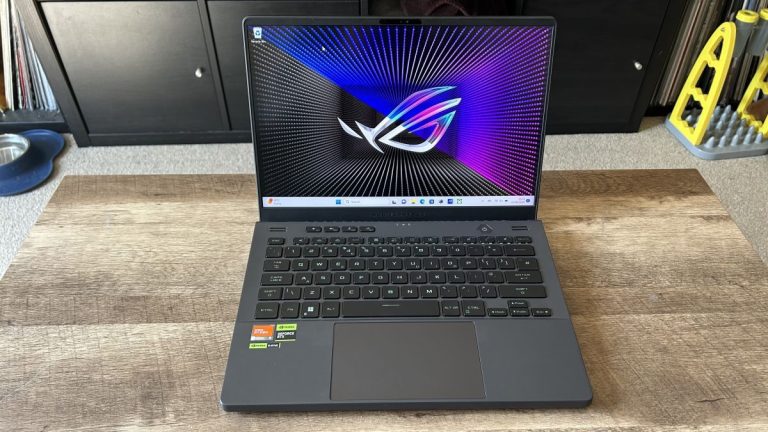 Asus ROG Zephyrus G14 gaming laptop on wooden table