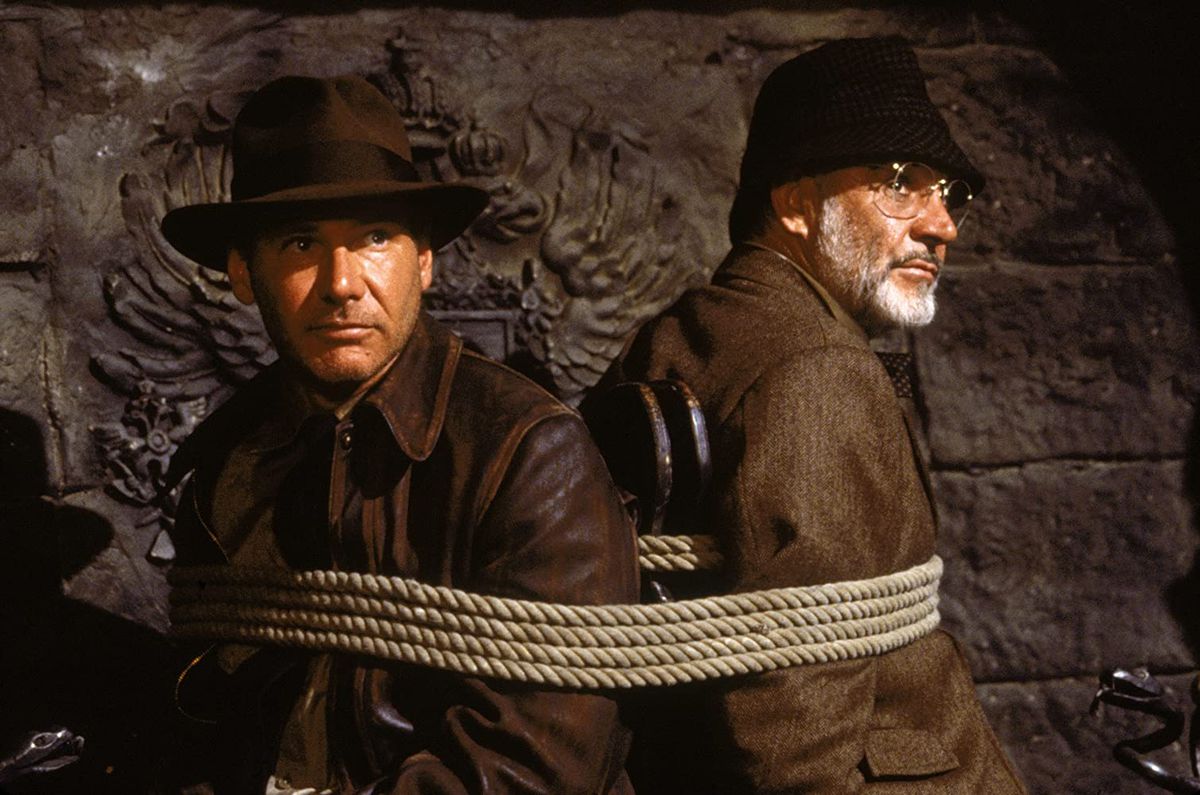 Indiana Jones (Harrison Ford) et Henry Jones (Sean Connery) sont attachés à une chaise