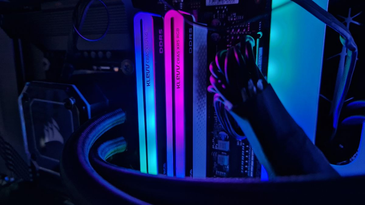 Klevv Cras XR5 RGB DDR5 RAM with blue and pink RGB lighting while installed in a gaming PC