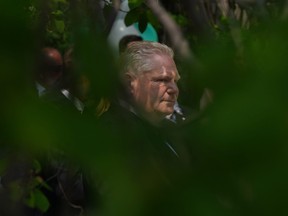 Le premier ministre de l'Ontario, Doug Ford, assiste à l'ouverture officielle de l'établissement de soins palliatifs agrandi de Kensington Health à Toronto, le mardi 23 mai 2023.