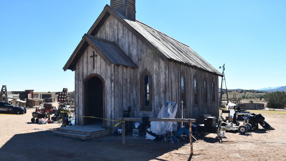 The church building on the set of Rust, surrounded by film equipment.