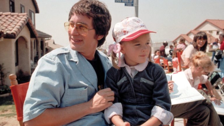 Director Steven Spielberg, Drew Barrymore on the set of E.T., 1982