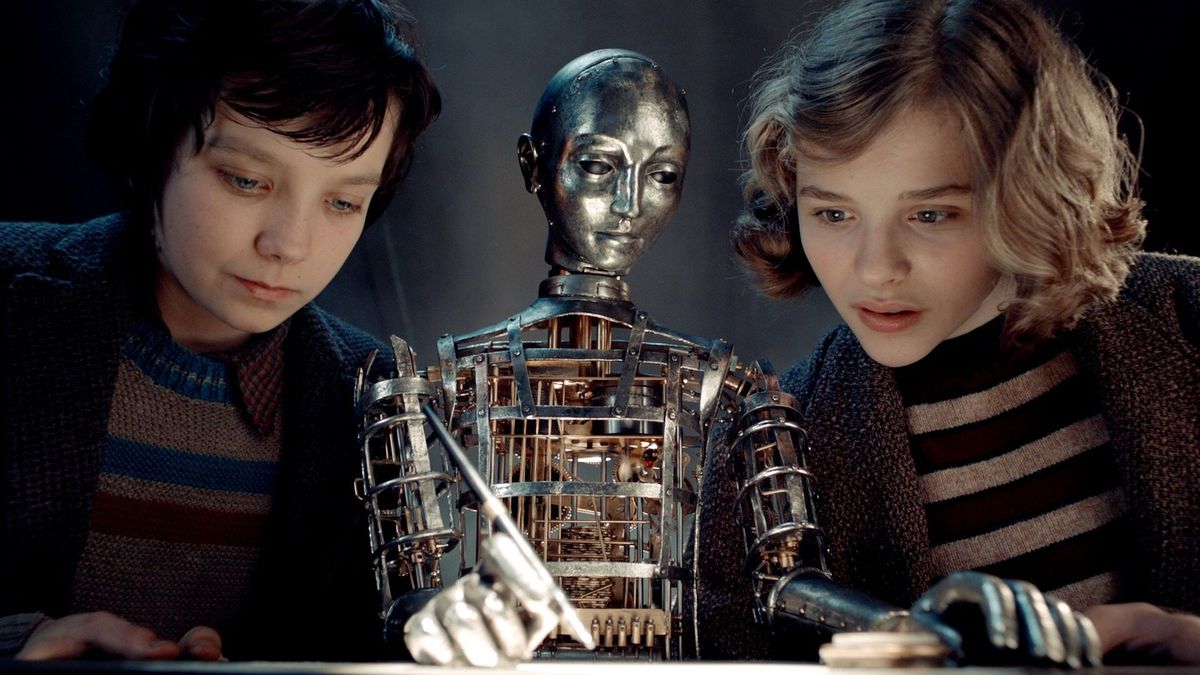 Asa Butterfield et Chloë Grace Moretz dans Hugo.