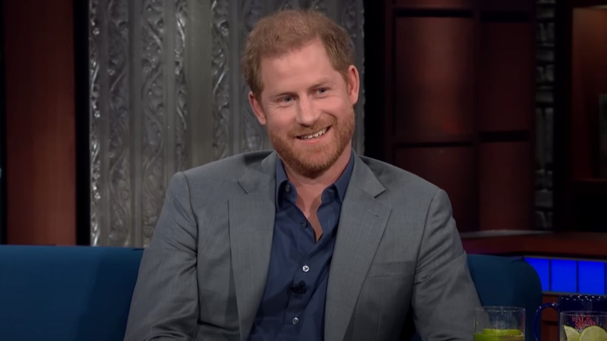 Prince Harry smiling on the Stephen Colbert