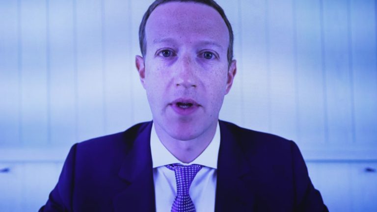 mark zuckerburg addressing the camera, blued