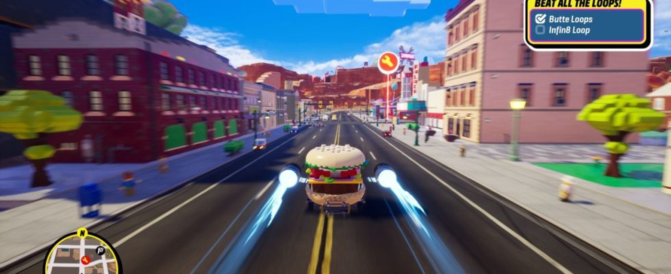 A burger car racing down a city street in Lego 2K Drive.