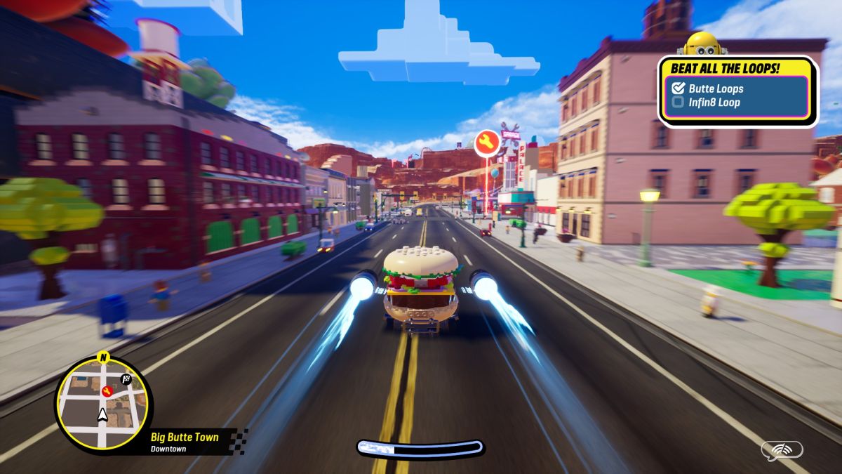 A burger car racing down a city street in Lego 2K Drive.