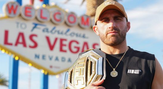 Alexander Volkanovski poses for a photo in front of the Welcome to Fabulous Las Vegas sign during UFC International Fight Week on July 3, 2023 in Las Vegas, Nevada