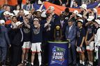 Les Virginia Cavaliers célèbrent leur victoire 85-77 contre les Texas Tech Red Raiders pour remporter le match du championnat national masculin de la NCAA 2019 au stade US Bank à Minneapolis, Minnesota, lundi (Getty Images)