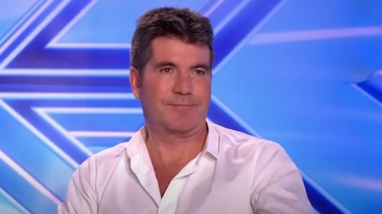 Simon Cowell behind judge